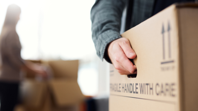 Man carrying moving box